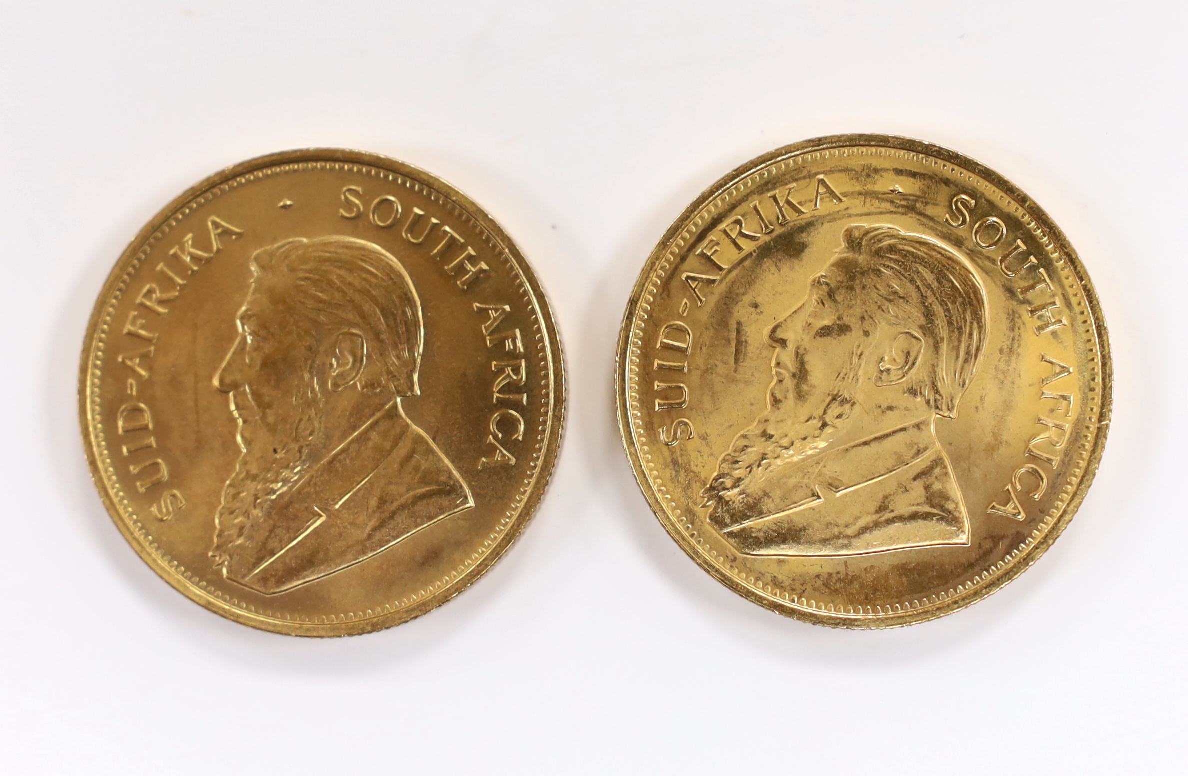 Gold coins, South Africa, two gold 1oz. Krugerrands, 1975, near UNC (2oz.)